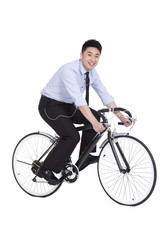 Fototapeta premium Cheerful young businessman on bike