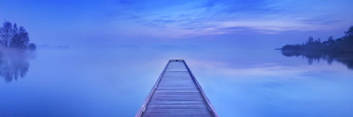 Outdoor kussens Jetty on a still lake at dawn in The Netherlands © sara_winter
