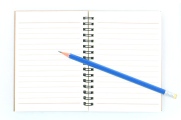 pencil and notebook on white background.