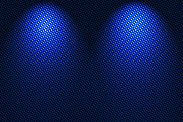 spotlight on blue carbon fiber background.