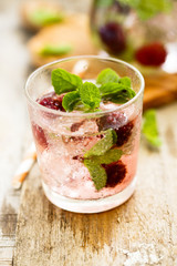 Cocktail with blackberry and fresh mint