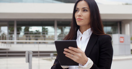 Young contemplative businesswoman