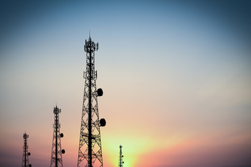 Silhouette phone antenna.Sunset background