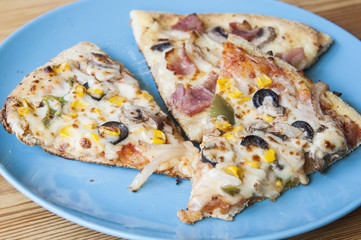 Three slices of pizza