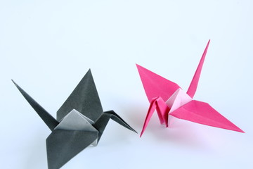 Coulple of paper cranes with white background