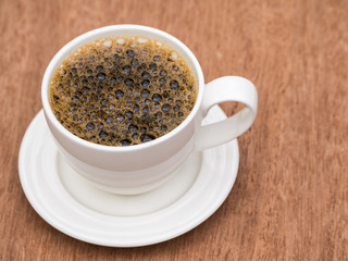 Coffee on grunge wooden background