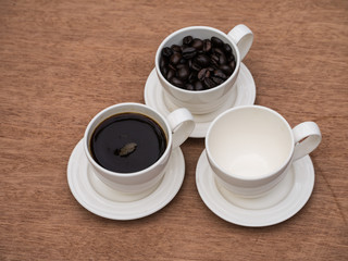 Coffee on grunge wooden background