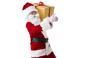Santa Claus with heavy Christmas gift
