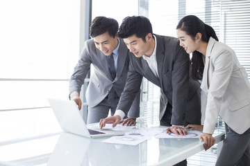 Young business person talking in meeting room