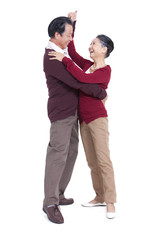 Happy senior couple dancing, face to face