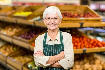 Senior worker with arms crossed 