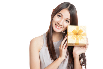 Beautiful young Asian woman with golden gift box