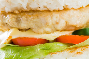 close-up of  Japanese food, grilled meat in Rice burger, served