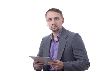 Man in suit holding tablet