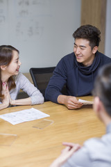 Naklejka premium IT workers having a meeting in board room