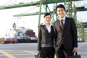 businesspeople at a shipping port