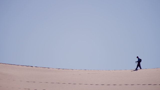 Trekking success desert girl sun sky heat dry sand