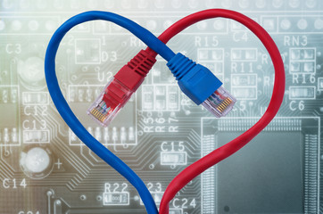 Color network cables  in form of human heart.  Data Network Hardware Concept. Toned image....