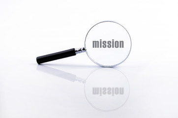 Magnifying glass in a metal frame with rubber black handle