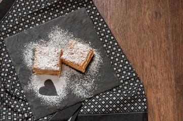 Two piece of Mille-Feuille puff pastry or Napoleon