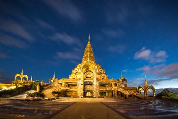 Zelfklevend Fotobehang Phra That Pa Son Kaew at night © thanakritz