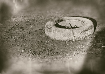 old tyre on the beach