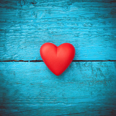 Red heart on the blue boards