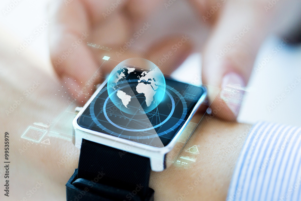 Sticker close up of hand with globe hologram on smartwatch