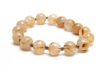 bracelet Rutillated Quartz lucky stone with white background