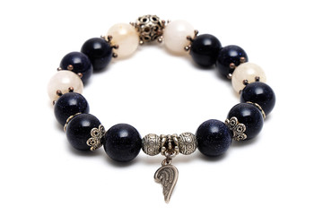 bracelet mix lucky bluesand stone and golden Rutillated Quartz  with white isolate background