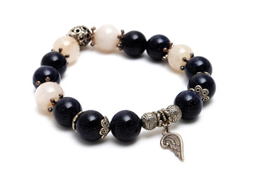 bracelet mix lucky bluesand stone and golden Rutillated Quartz  with white isolate background