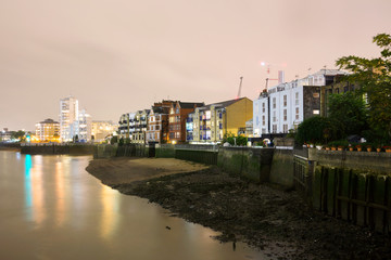 Buildings at night along the River Thames