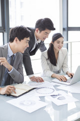 Young business person talking in meeting