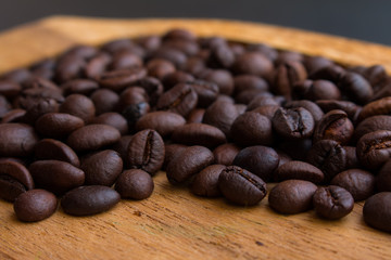 Coffee beans on the wooden floor