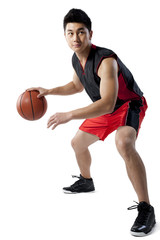 Naklejka premium Man dribbling basketball