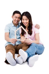 Affectionate couple holding frame