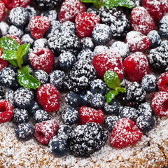 Very Berry Coffee Cake on white background. Selective focus.