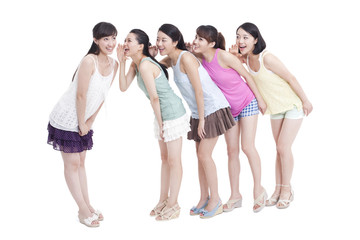 Fototapeta premium Best female friends whispering in a row