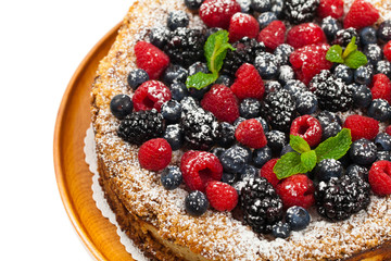 Very Berry Coffee Cake on white background. Selective focus.