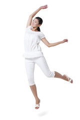 Fototapeta na wymiar Young Woman Jumping in the Air