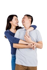 Fototapeta premium Cheerful woman embracing man