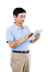 Man using digital tablet while standing