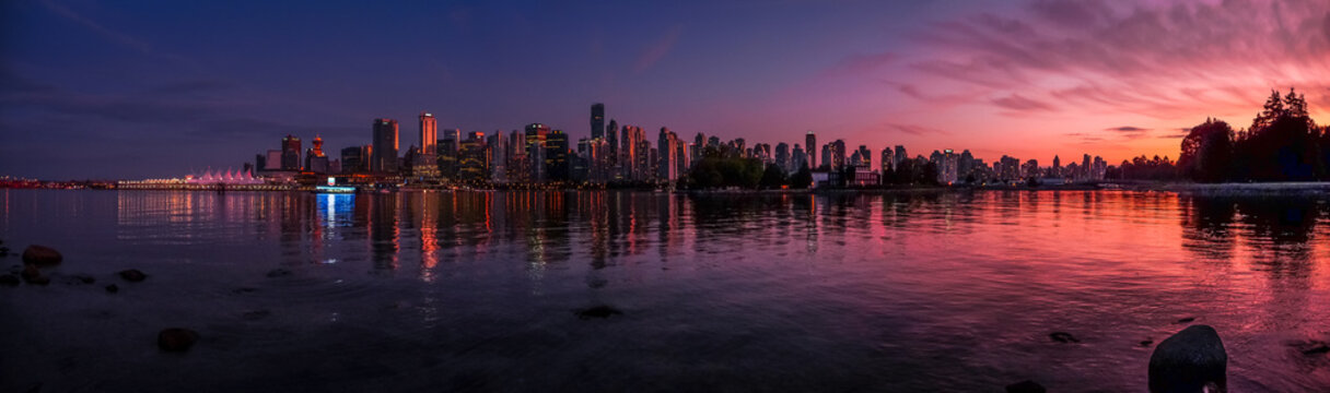 Beautiful Vancouver skyline and harbor with idyllic sunset glow, Canada