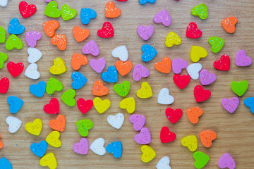 Fototapeta na wymiar Small multi-colored hearts