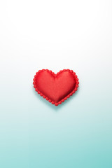 Single red heart on gradated background