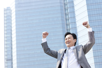 Excited businessman celebrating