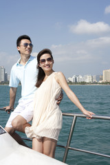 Couple Relaxing on a Yacht