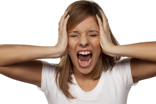 frustrated young woman screaming