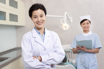Fototapeta premium Dentist and nurse in dental clinic