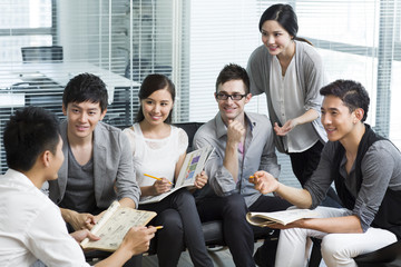 Young office workers holding a meeting